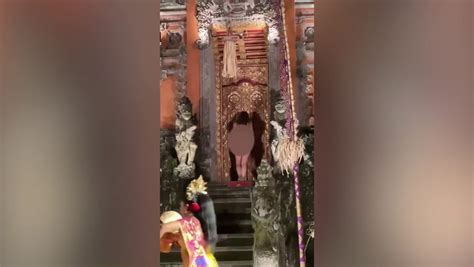 Bali sends German tourist who stripped naked in temple for。